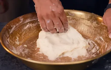 Dough preparation process with yeast and flour mixture