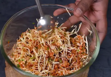 Stuffing mixture with onions, spices, and mozzarella cheese.