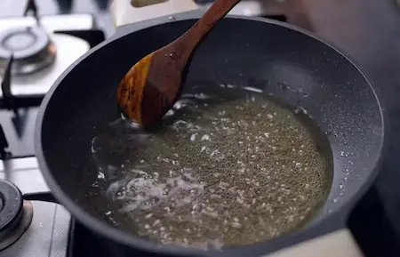 Preparing sugar syrup for boondi ladoo with one-string consistency