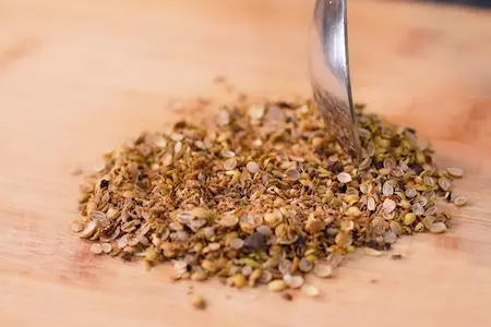 Preparing pounded masala by dry roasting and grinding spices