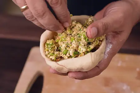 Step 4: filling the kulcha with paneer matar stuffing for Paneer Matar Kulcha