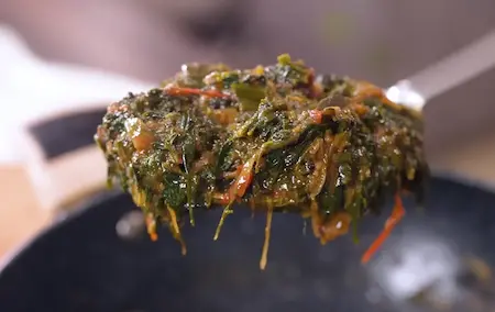 Step 6: adding tomato and tamarind to Winter Saag Sabji