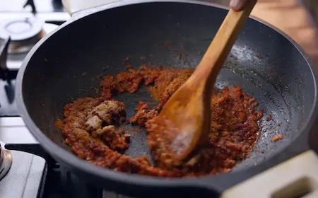 Cooking tomato masala for Lababdar Dhaba Style Egg Masala Recipe