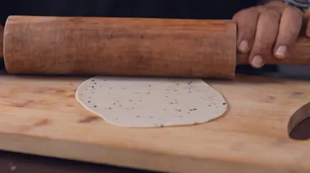 Step 3: Rolling dough for Mini Singara into oblong shape