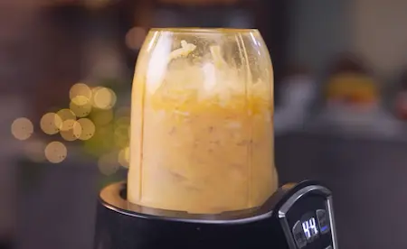 Step 2: Grinding fresh coconut, garlic, shallots and jeera into a smooth paste for Mango Curry