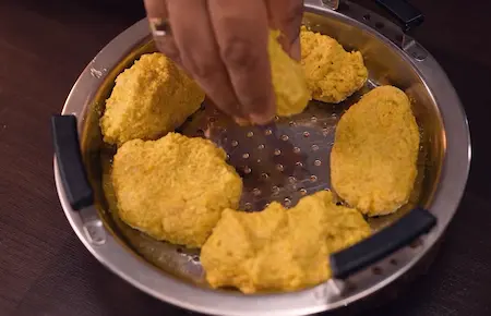 Step 3: Shaping Dudhi Muthiya logs by hand