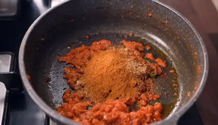 Step 5: Adding dry spices to the masala for Soyabean Ki Sabzi