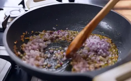 Cooking onion base for Lababdar Dhaba Style Egg Masala Recipe