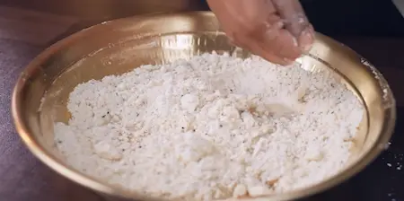 Step 2: Rubbing oil into flour for Mini Singara dough