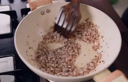 Step 3: Sautéing onions golden brown for Bhujia Shing Ki Sabzi