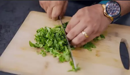 Preparing fresh methi leaves for Methi Wada