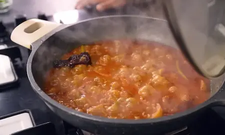 Cooking Aloo & Mooli Thechwani