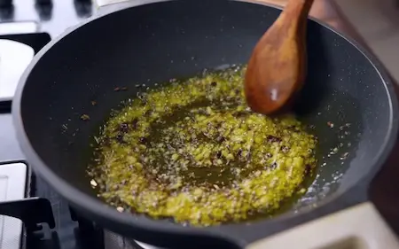 Preparing tempering for Lababdar Dhaba Style Egg Masala Recipe