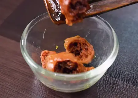 Step 2: Frying moong dal wadi in mustard oil for Bengali Niramish Jhol