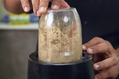 Step 3: Grinding powdered masala for Creamy Pahadi-Style Rajma Madra Recipe
