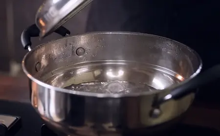 Step 3: preheating steamer for Soft & Spongy Market Style Khaman Dhokla Recipe