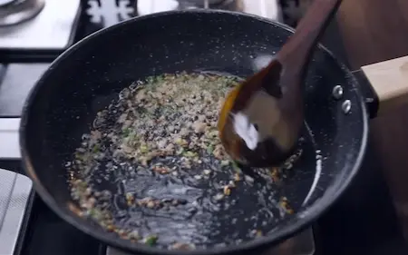 Step 1: Adding ginger and green chilli to Mini Singara masala